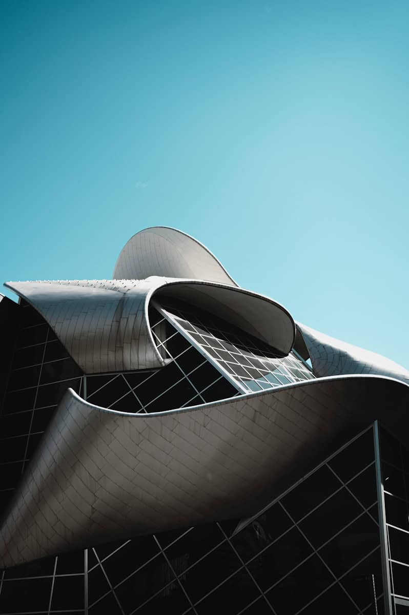 white concrete building under blue sky during daytime
