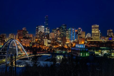 city skyline during night time
